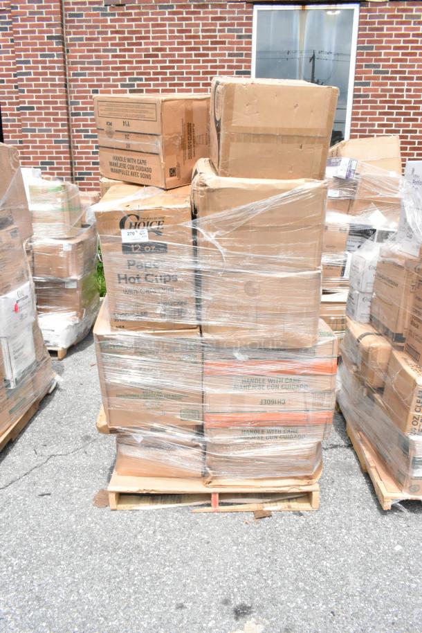 Pallet of boxed items, including Choice brand hot cups, wrapped in plastic. Boxes show "Handle with Care" label. Slight wear visible.