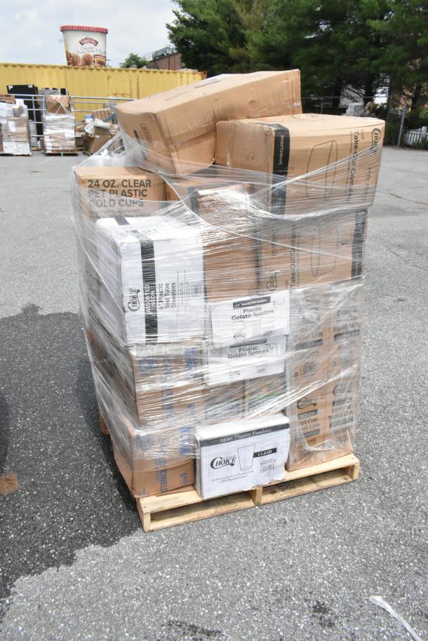 Pallet of assorted cardboard boxes wrapped in plastic, containing plastic cups and gelato spoons, Choice brand visible.