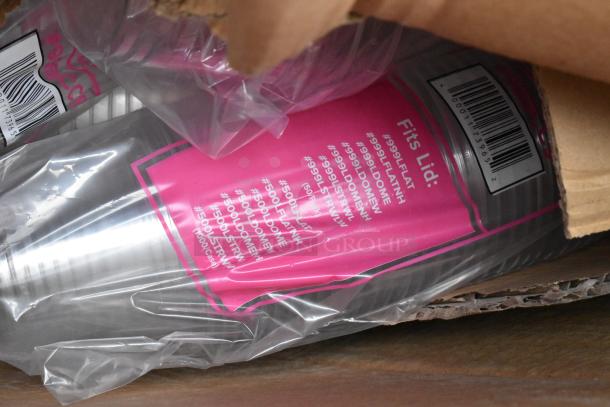 Plastic cup pack in original packaging, pink label with lid compatibility codes. Item appears new, barcode visible.