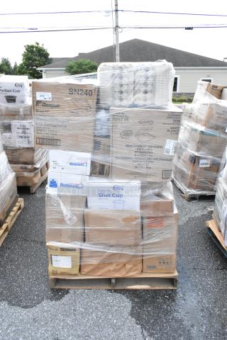 Pallet of assorted plastic food service containers, includes brands like Dart and Genpak, shrink-wrapped, in new condition.
