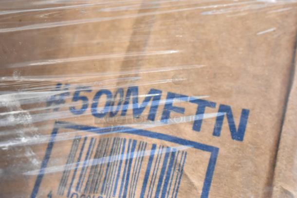 Cardboard box marked "#500MFTN" with visible barcode, wrapped in plastic. Condition appears intact, suitable for shipping or storage.