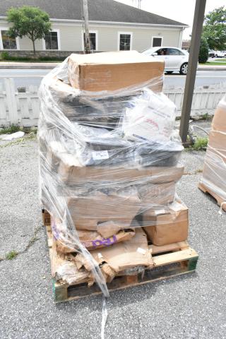 Pallet of assorted boxes wrapped in plastic, marked "279" on label. Boxes show wear; contents and condition unknown.