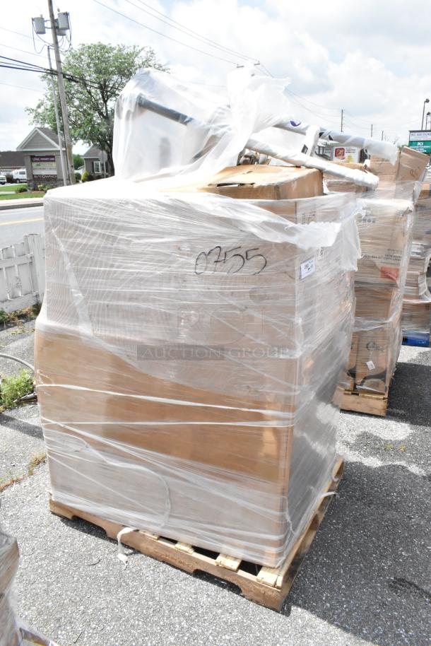 Pallet wrapped in plastic, containing boxed items, marked "0755." Items appear sealed, condition unknown.