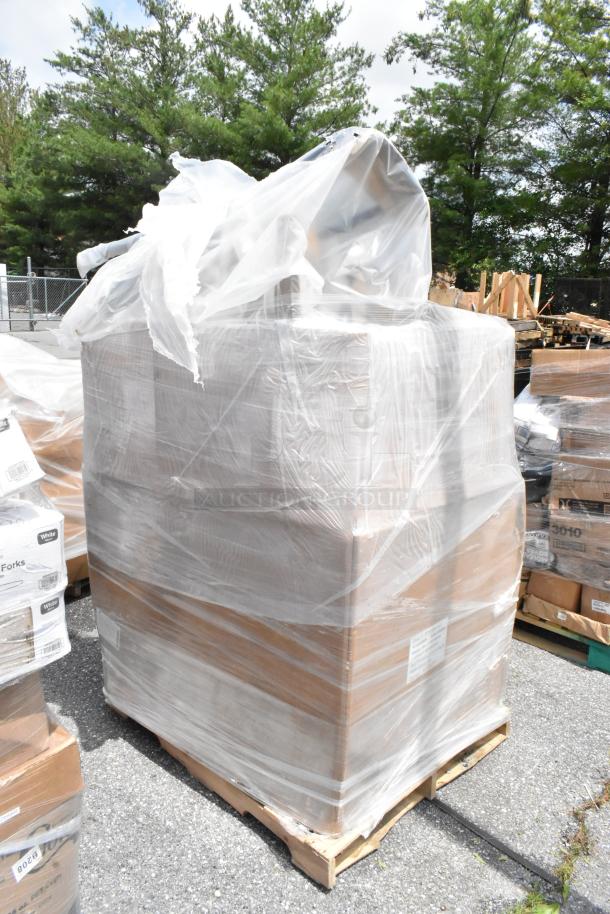 Pallet of boxed items wrapped in plastic, on an outdoor lot. Condition unknown, label on packaging states "White Forks."