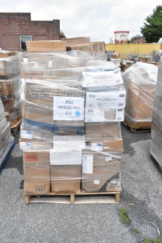 Pallet of assorted household goods, wrapped in plastic, containing Scott paper products and medium weight forks. Labels show PCI APR25-191.