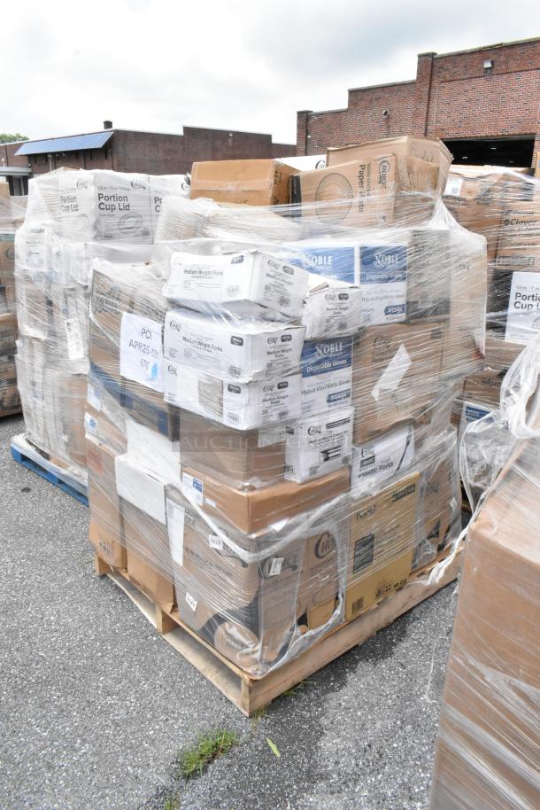 Pallet of assorted boxed goods including plastic utensils and disposable gloves, wrapped in plastic for shipping, in good condition.