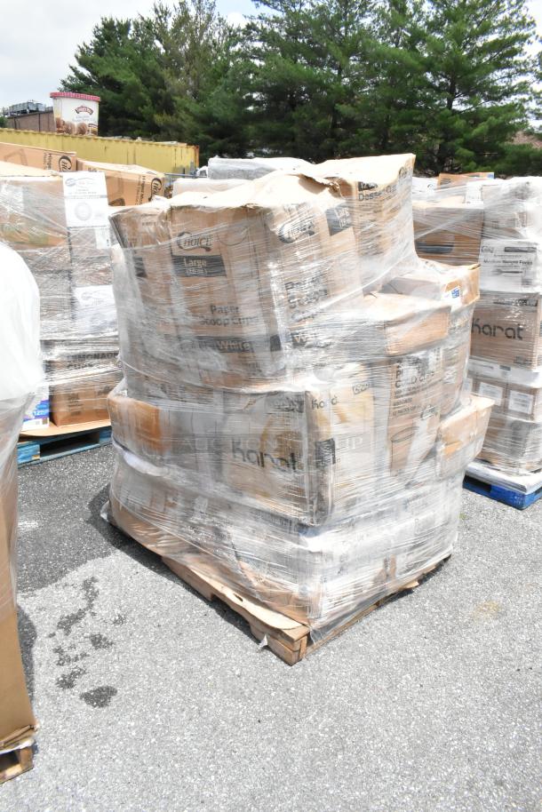Pallet of Karat disposable paper cups, wrapped in plastic, boxes labeled "Paper Cold Cups." Some box wear visible.