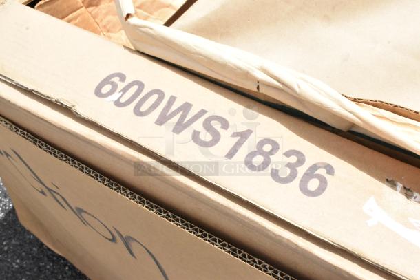 Cardboard box with visible marking "600WS1836," possibly indicating model or batch number. Edges slightly worn.