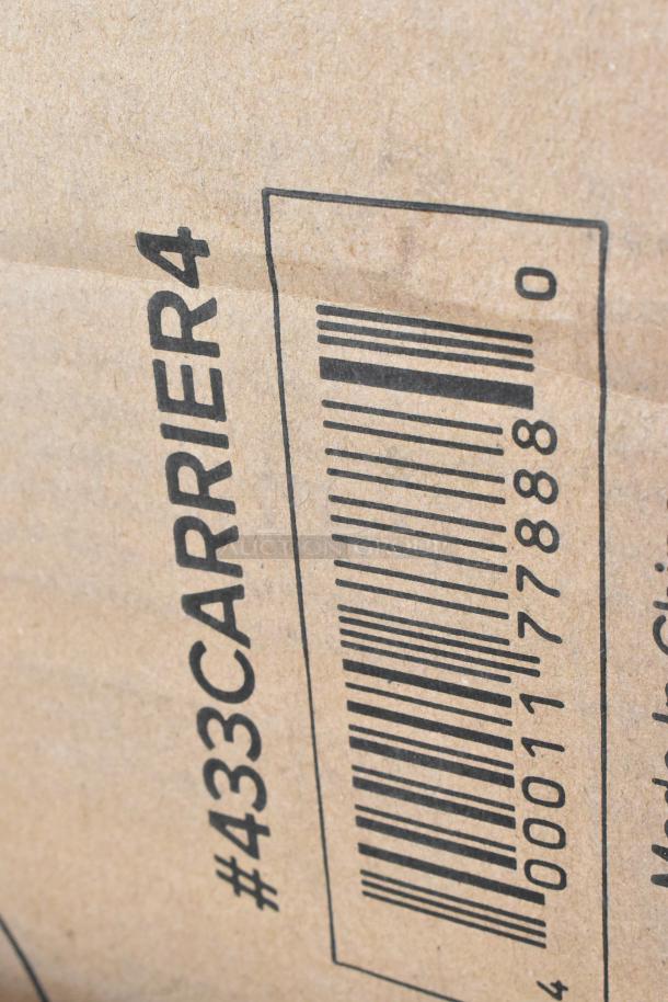 Close-up of a cardboard box featuring text "#433CARRIER4" and a barcode. Box appears sealed and in good condition.
