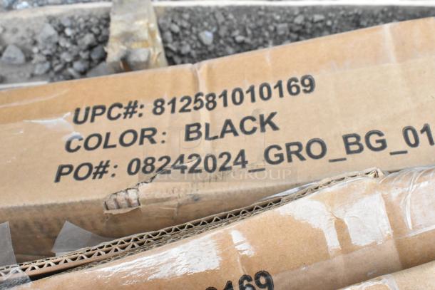 Cardboard box with UPC: 812581010169, Color: Black, PO: 08242024_GRO_BG_01, showing moderate wear.