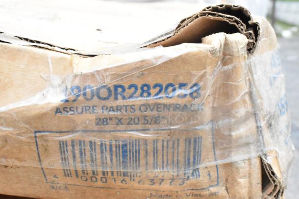 Cardboard box labeled "Assure Parts Oven Rack," size 28" x 20 5/8", model 190OR282058, made in Vietnam, slightly worn condition.