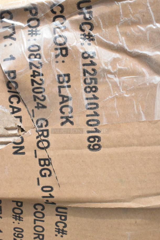 Cardboard box with black text: UPC# 812581010169, Color: Black, PO# 08242024, Qty: 1, wrapped in plastic.