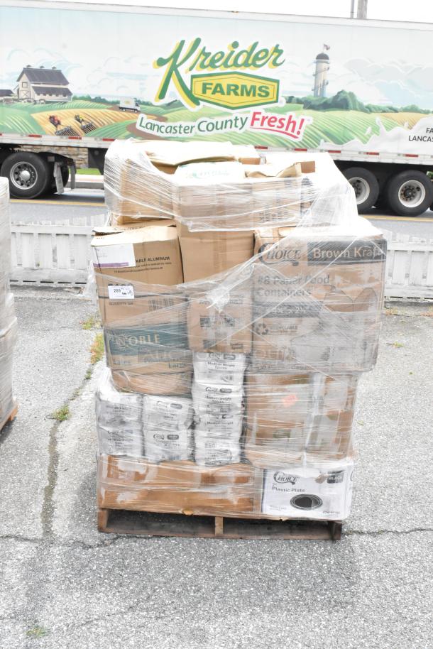 Pallet with various boxed food service supplies wrapped in plastic, including aluminum foil and paper containers.