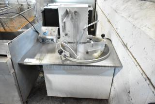 Hilliard's chocolate tempering machine, stainless steel, commercial use, integrated control panel, used condition.