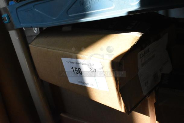 Cardboard box on shelf with label "156 QTY" from PCI Auctions, includes barcode and product details sticker.