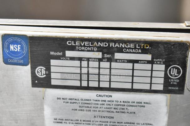 Cleveland Range Ltd. label with NSF certification, model, voltage, and safety instructions, indicating appliance standards.