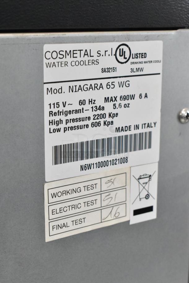 Cosmetal Niagara 65 WG water cooler label, 115V, 60Hz, 690W. Uses refrigerant 134a. Made in Italy. Testing marks visible.