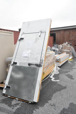BRAND NEW SCRATCH AND DENT! Kolpak floorless walk-in refrigerator box for Domino's, featuring Kolpak 84" Clear Vu swing doors. Potential missing parts.