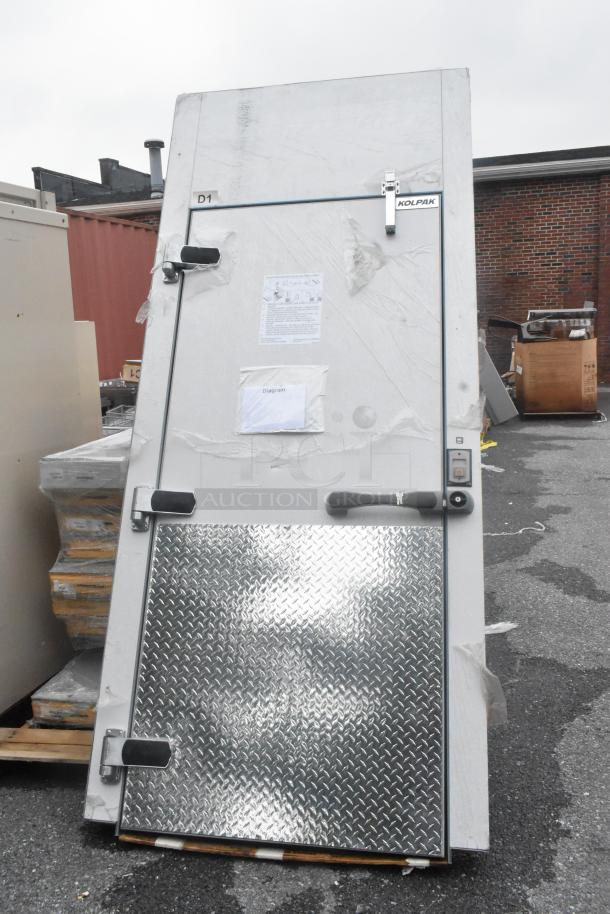 BRAND NEW Kolpak walk-in box refrigerator, floorless, 9'8"x13'6"x9'3.75", for Domino's. Includes 84" swing doors, may miss parts.