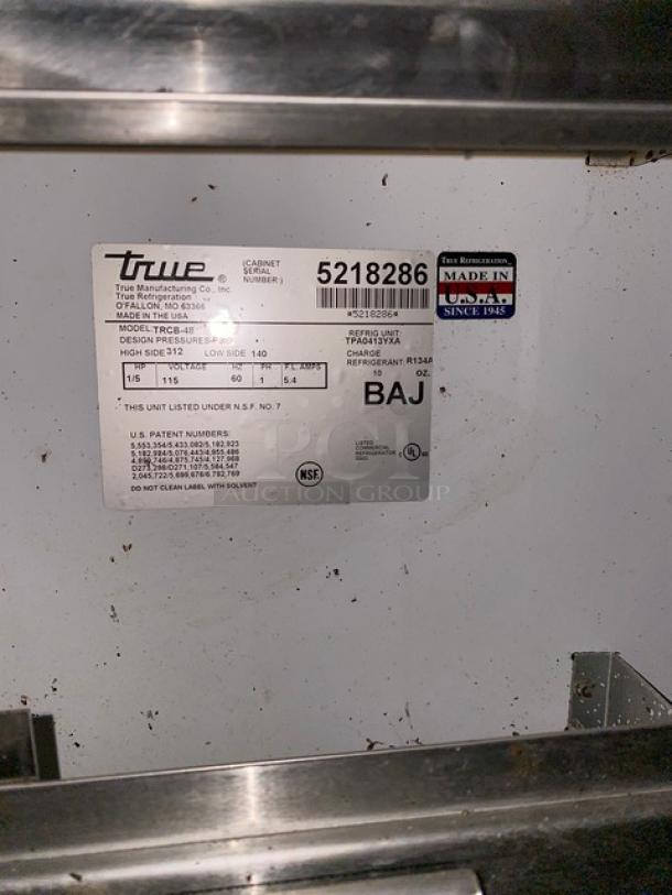 True TUC-48 refrigeration unit label, model TUC-48, serial 5218286, design pressures listed, NSF certified, USA made.