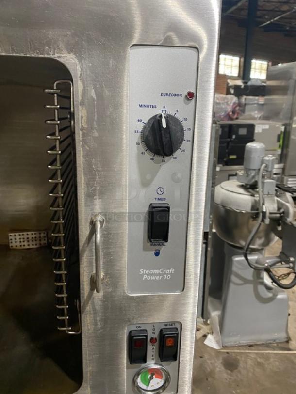 SteamCraft Power 10 commercial steamer in used condition. Features timer dial, manual/timed switch, and control buttons.