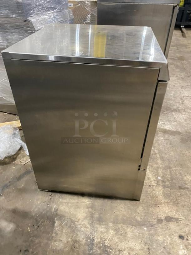 Stainless steel cabinet with a sleek, polished finish. Appears in good condition, suitable for industrial or commercial use.