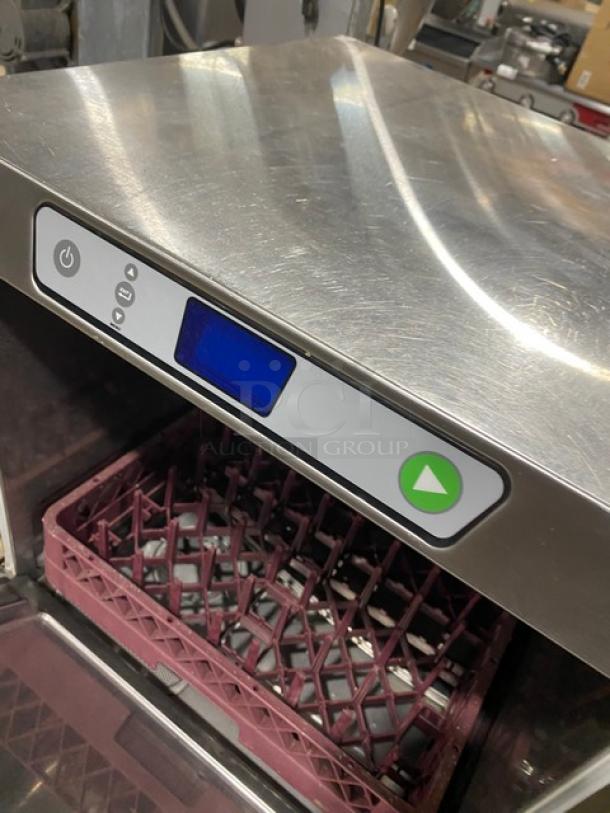 Commercial under-counter dishwasher with digital display, stainless steel exterior, built-in rack, excellent condition.