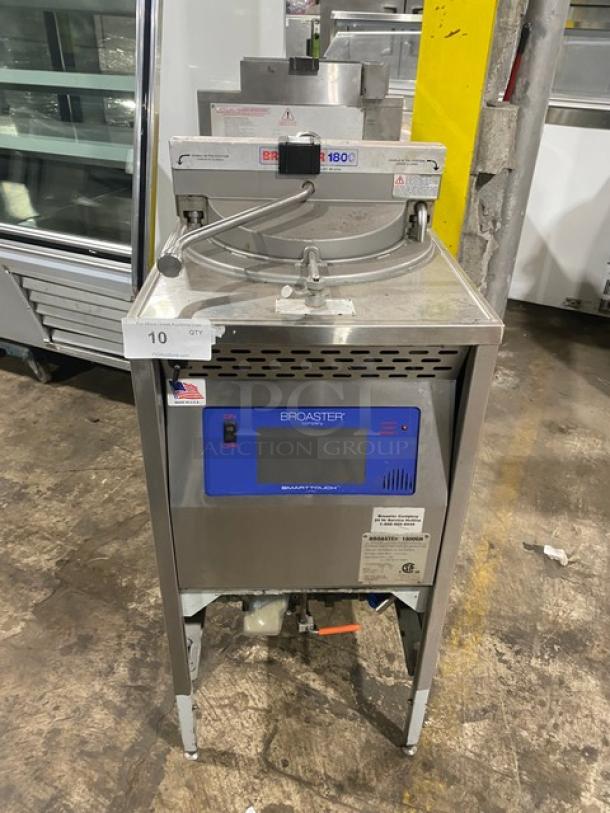 Broaster 1800 pressure fryer, stainless steel, digital controls, American flag label, quantity tag 10, industrial condition.