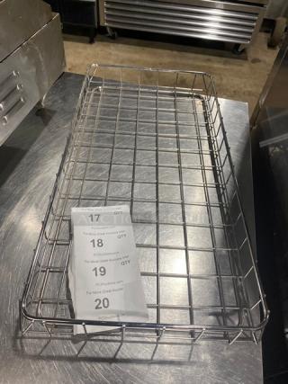 Stainless steel wire rack in good condition, rectangular shape. Includes auction label with item numbers 17 to 20.