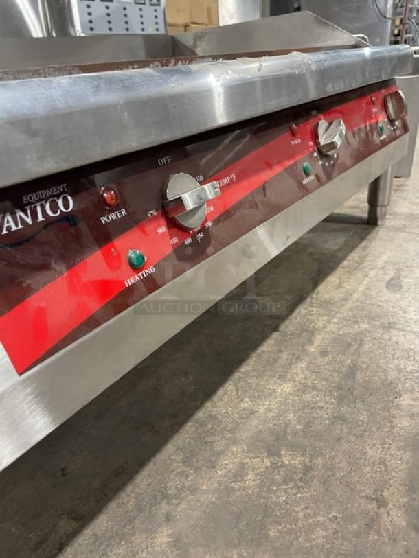Stainless steel cooking equipment with dials for temperature control, labeled "Atco Equipment". Shows power and heating indicators.