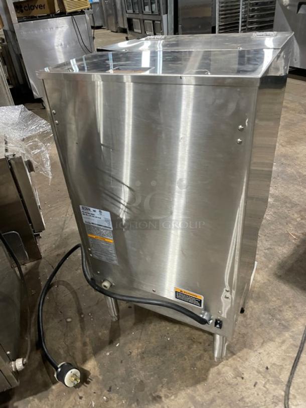 Stainless steel commercial kitchen equipment, with visible power cord and control label; used condition.