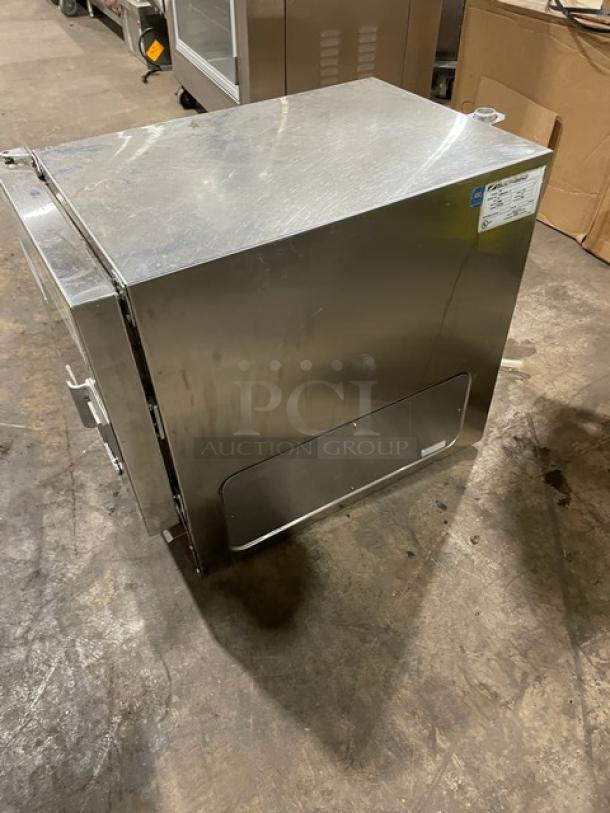 Stainless steel commercial kitchen cabinet, durable construction, top-hinged door, label indicates model and specs, good condition.
