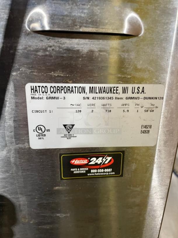 Hatco GRMW-3 warming equipment label, showing serial number, voltage, wattage, and certifications. UL listed, made in USA.