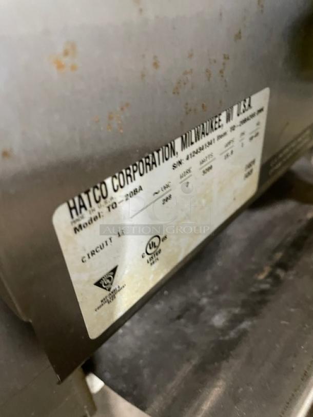 Hatco Corporation toaster, Model TQ-208A. Metal exterior with label showing model details. Used condition.