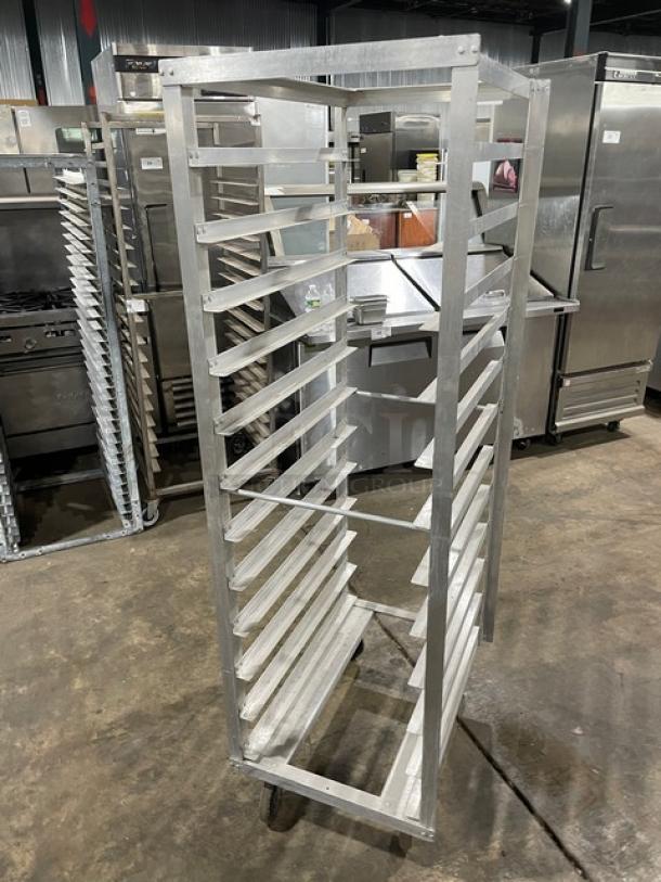 Stainless steel commercial bakery rack, 20 shelves, on casters, used condition. Ideal for baking operations.
