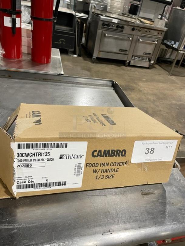 Cambro food pan cover with handle, 1/3 size, model 30CWCHTR1135, unopened in box. Label indicates case quantity.