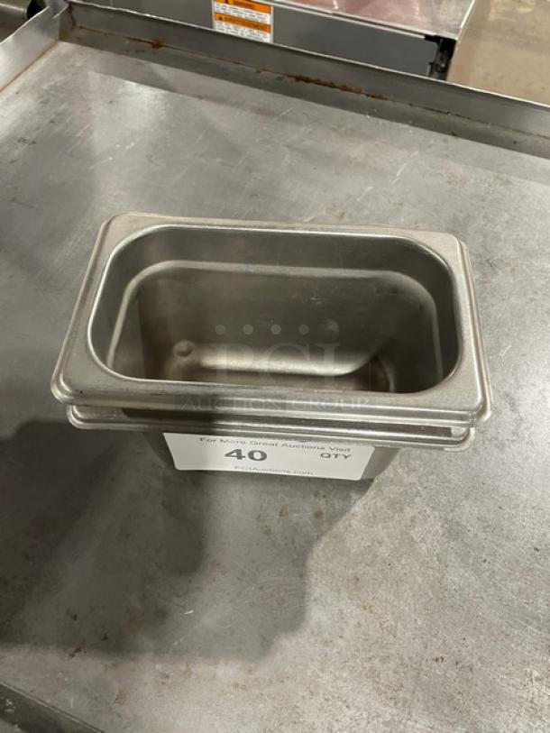 Stainless steel steam pan in good condition, rectangular shape. Tag indicates auction item number 40.