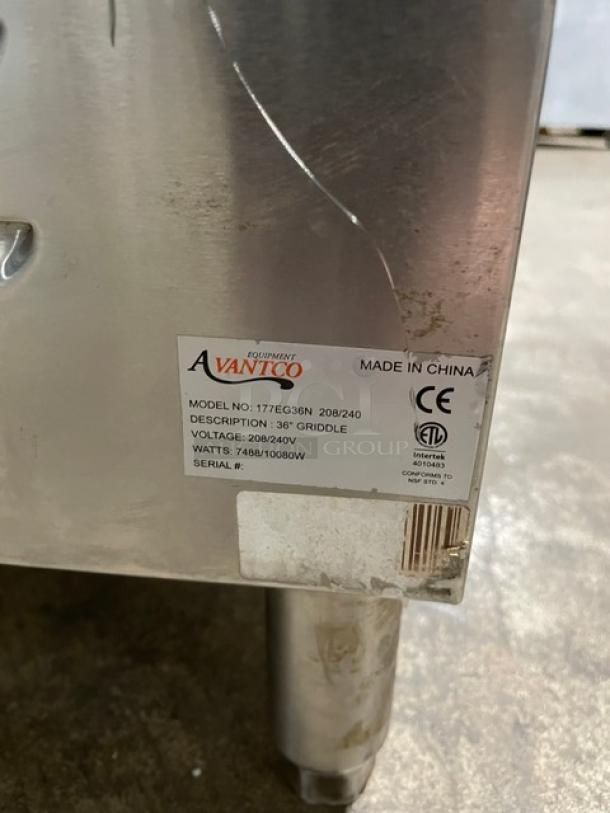 Avantco 36" griddle tag, model 177E36GN, 208/240V, 7480/10080W, made in China. Silver finish, visible wear.