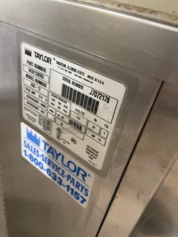 Taylor equipment label with part number X49425, model 791-33, serial number J7072178. Made in USA.