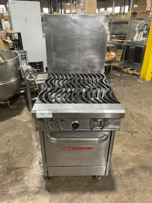 Southbend commercial gas range with grill top, stainless steel, suitable for restaurant use. Good condition, visible model tag.