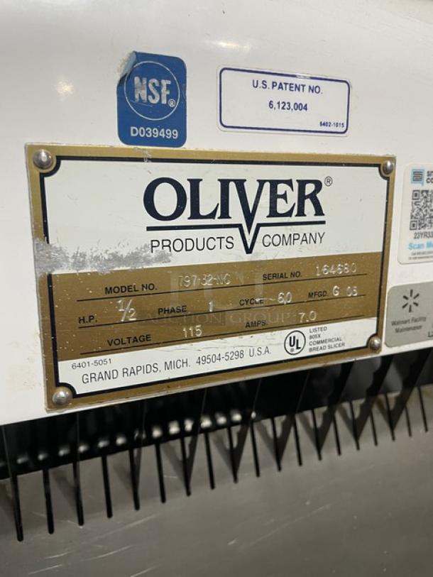 Oliver Products Company bread slicer, model 797-32-NG, serial 164650. 1/2 HP, 115V, listed commercial slicer. NSF and UL labels.
