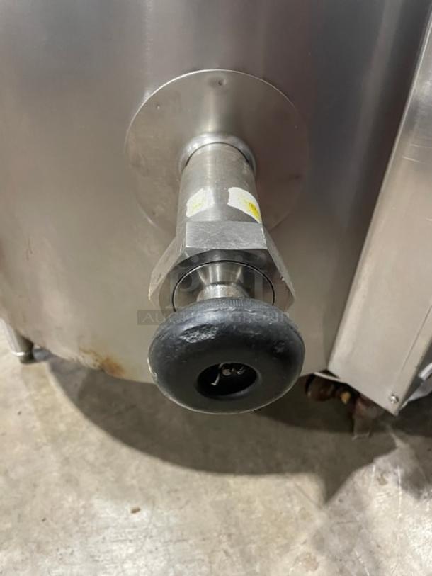 Groen AH140 stainless steel steam jacketed kettle, natural gas powered, on legs, with black handle, 40 lb. capacity, 115V, 1 phase.
