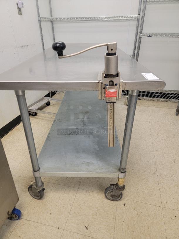 6' Stainless Worktable with Edlund Can Opener! Tired of clutter and slow prep times in your commercial kitchen? Upgrade your workspace with this versatile 6-foot Stainless Steel Worktable on Casters, complete with an attached Commercial Edlund Can Opener! *BUYER MUST REMOVE - NO SHIPPING OR HANDLING AVAILABLE* - Image 2 of 2