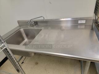 5' Stainless Workstation w/ Sink & Faucets! Looking to upgrade your prep area or add a dedicated wash station? This 5-foot Stainless Steel Workstation is a fantastic find, combining ample counter space with a built-in sink, making it incredibly versatile for a variety of settings! *BUYER MUST REMOVE - NO SHIPPING OR HANDLING AVAILABLE*