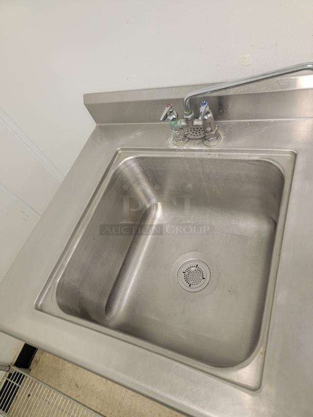 5' Stainless Workstation w/ Sink & Faucets! Looking to upgrade your prep area or add a dedicated wash station? This 5-foot Stainless Steel Workstation is a fantastic find, combining ample counter space with a built-in sink, making it incredibly versatile for a variety of settings! *BUYER MUST REMOVE - NO SHIPPING OR HANDLING AVAILABLE* - Image 2 of 4
