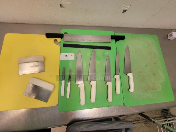 3 Commercial Cutting boards with assorted cutting utensils.  2- 2' x 18" 1- 20" x 15
Commercial Cutting Board & Utensil Set - Perfect for Any Kitchen! Boost your kitchen's prep efficiency with this convenient package! We're offering (3) durable Commercial Cutting Boards paired with a selection of assorted cutting utensils, ideal for restaurants, catering, food trucks, or even home chefs who demand professional quality. *BUYER MUST REMOVE - NO SHIPPING OR HANDLING AVAILABLE* - Image 1 of 5