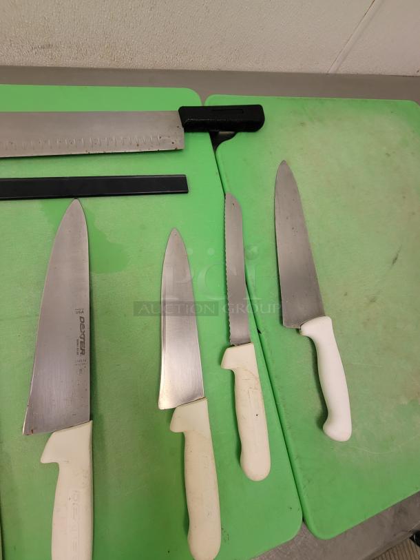 3 Commercial Cutting boards with assorted cutting utensils.  2- 2' x 18" 1- 20" x 15
Commercial Cutting Board & Utensil Set - Perfect for Any Kitchen! Boost your kitchen's prep efficiency with this convenient package! We're offering (3) durable Commercial Cutting Boards paired with a selection of assorted cutting utensils, ideal for restaurants, catering, food trucks, or even home chefs who demand professional quality. *BUYER MUST REMOVE - NO SHIPPING OR HANDLING AVAILABLE* - Image 5 of 5