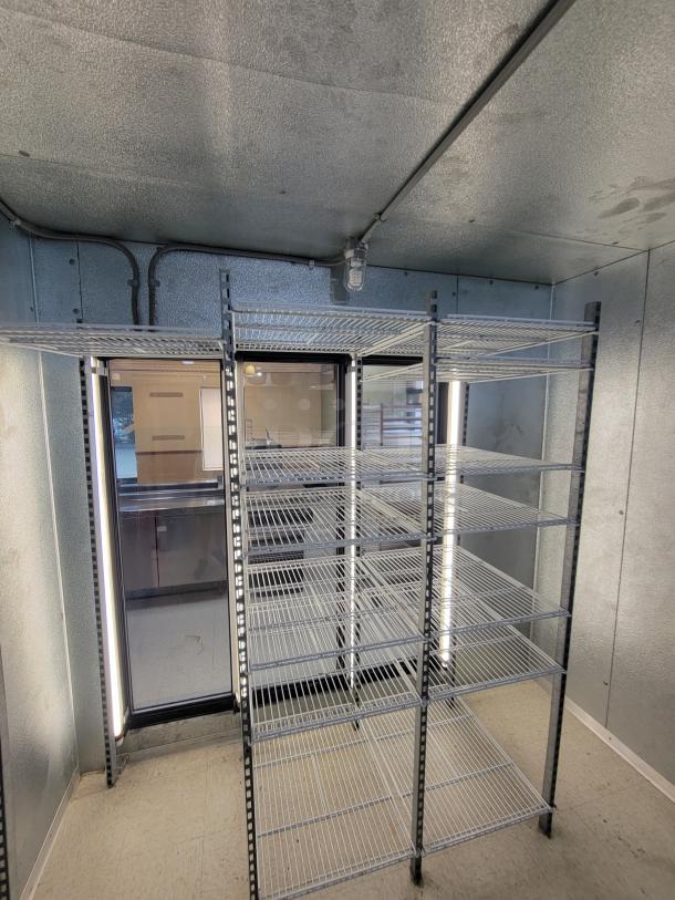 Imperial Super Insulated 18' Walk-in Cooler with 3 Glass Door Pass-Through & Bonus Shelving! Massive cold storage and display solution available! We're offering a fantastic deal on a 18-foot Imperial Super Insulated Walk-in Cooler, featuring a convenient 3-Glass Door Pass-Through for easy merchandising and access. Heatcraft MOHO25 Outdoor/Rooftop condensing unit.  As a special bonus, this package includes Metro Racks and additional shelving to get you organized right away! - *BUYER MUST DISASSEMBLE AND REMOVE - NO SHIPPING OR HANDLING AVAILABLE* - Image 13 of 20