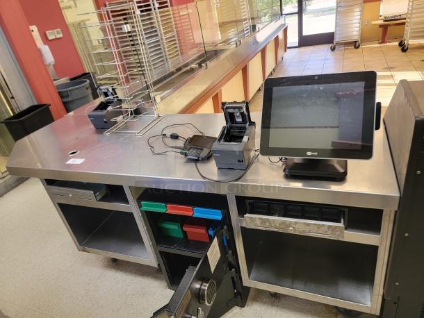 90" Stainless Steel POS Workstation with NCR Setup! Streamline your point-of-sale operations! We're offering a robust 90-inch Stainless Steel POS Workstation complete with BONUS NCR Equipment, providing a ready-to-use solution for your restaurant, retail store, or quick-service establishment. This integrated setup combines durability with leading POS technology. *BUYER MUST REMOVE - NO SHIPPING OR HANDLING AVAILABLE* - Image 2 of 5