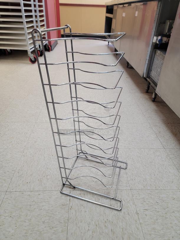 27" Heavy Duty Chrome Pizza Pan Rack - Maximize Your Pizza Output! Streamline your pizza production and storage with this robust 27-inch Heavy Duty Chrome Pizza Pan Rack, an essential piece of equipment for any pizzeria, restaurant, or high-volume kitchen that needs efficient storage and cooling for pizza pans. *BUYER MUST REMOVE - NO SHIPPING OR HANDLING AVAILABLE* - Image 1 of 1